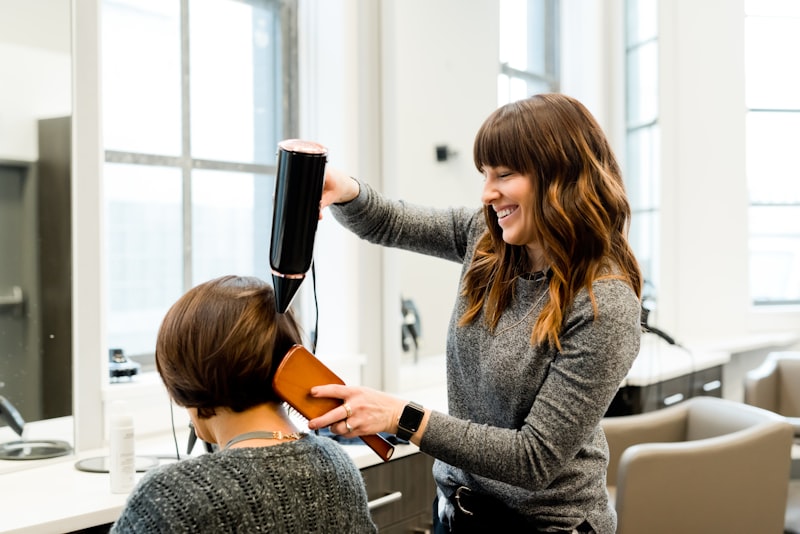 Customer paying at salon counter